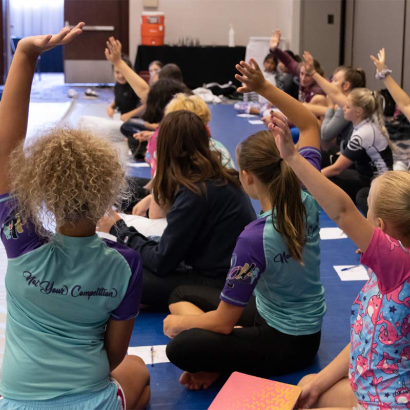 Photo of Next Gen girls and teens at Roll Model Women's Only Grappling Camp